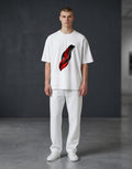 A&G white unisex t-shirt with a red and black abstract graphic print. Poly-cotton blend, 180 GSM, silicon-washed for softness.